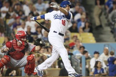 ANDRE ETHIER struggles against the Reds and is struck out during the game clipart
