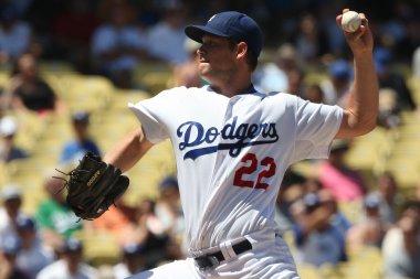 CLAYTON KERSHAW pitches during the game clipart