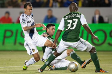 Juninho, major league soccer oyun sırasında steve purdy ve hanyer mosquera