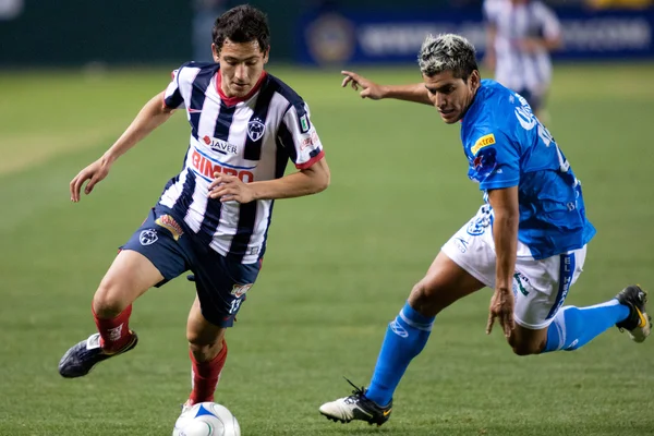 Darío Carreno y Manuel López en acción durante la InterLiga 2010 —  Fotos de Stock