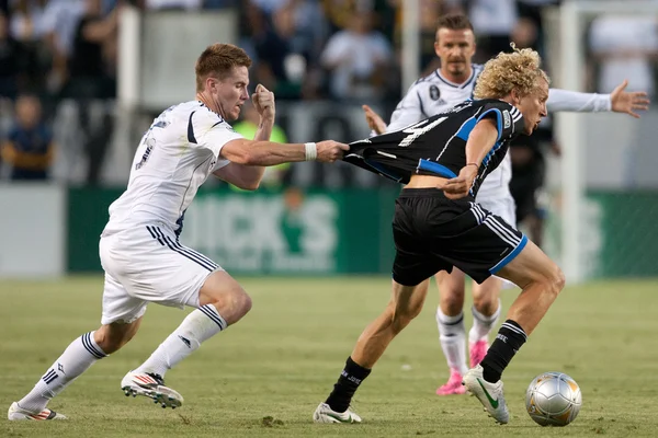 Bryan Gaul and Steven Lenhart in action during the Major League Soccer game — Stock Photo, Image