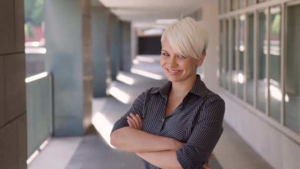 Portrait of happy confident business woman looking and smiling at camera. Sequence — Stock Video