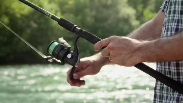 Rod and fishing reel. — Stock Video