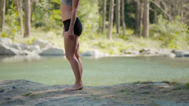 Woman stretching after exercising — Stock Video