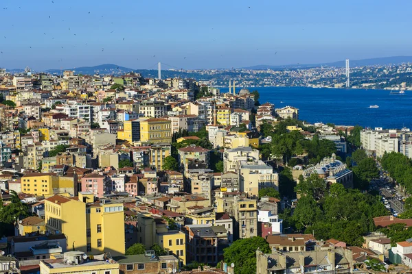 Aerial view of housing and Bosphorus bridge in suburb of Ortako — Stock Photo, Image