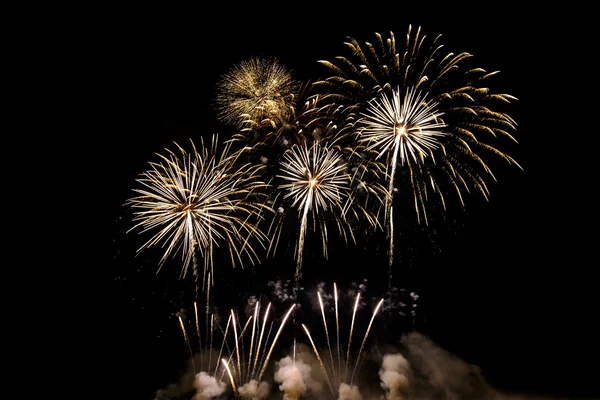 Colorful fireworks of various colors over night sky — Stock Photo, Image