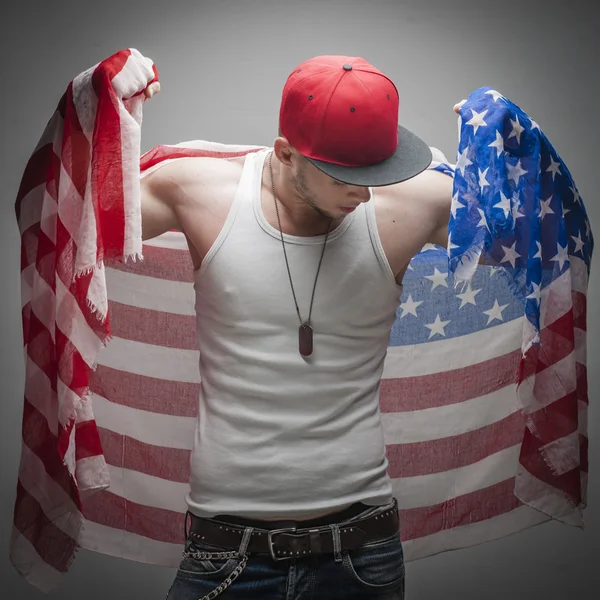 Strong man posing in Studio — Stock Photo, Image