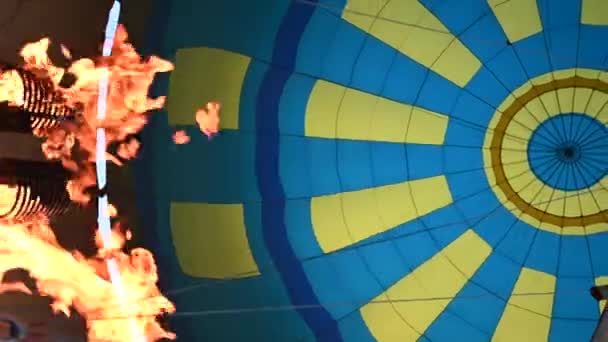 Hot air balloons open festival, balloons of different colours fly over rocky mountains, balloons flying on sunset over cloudy sky, 4k HDR cinematic footage — Video