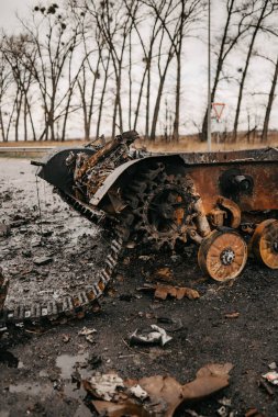 Borodyanka, Kyiv region, Ukraine. April 08, 2022: destruction and burnt out Russian military vehicle in Borodyanka clipart