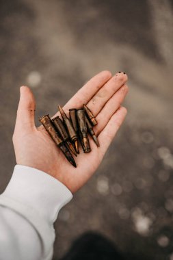 Borodyanka, Kyiv region, Ukraine. April 08, 2022: bullets in liberated village Borodyanka  clipart