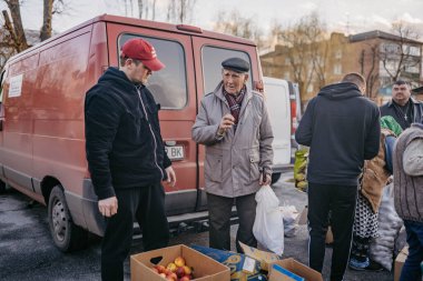 Borodyanka, Kyiv region, Ukraine. April 08, 2022: Humanitarian assistance in liberated village Borodyanka clipart