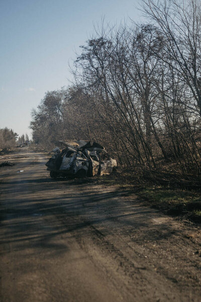 Borodyanka, Kyiv region, Ukraine. April 08, 2022: twisted wreckage of car being destroyed by russian army 