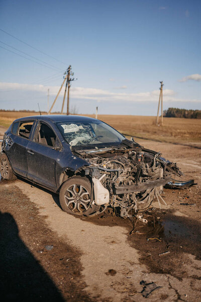 Borodyanka, Kyiv region, Ukraine. April 08, 2022: twisted wreckage of car being destroyed by russian army 