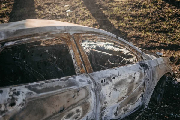 Borodyanka, Kyiv region, Ukraine. April 08, 2022: twisted wreckage of car being destroyed by russian army — Stock Photo