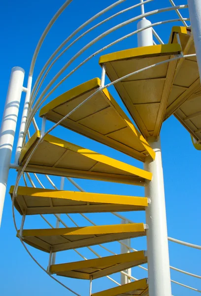 Yellow spiral ladder — Stock Photo, Image