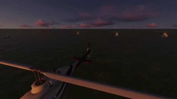 Plusieurs hélicoptères survolent la mer au coucher du soleil 