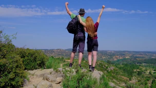 Man and woman raising hands up. Happy couple. — Video Stock