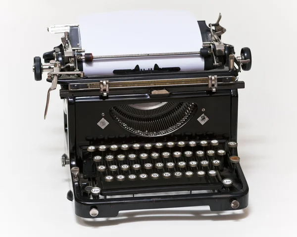 Old type writer on white background — Stock Photo, Image
