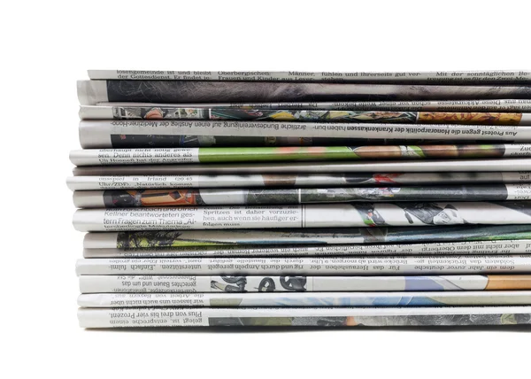 Pile of old newspapers on white — Stock Photo, Image