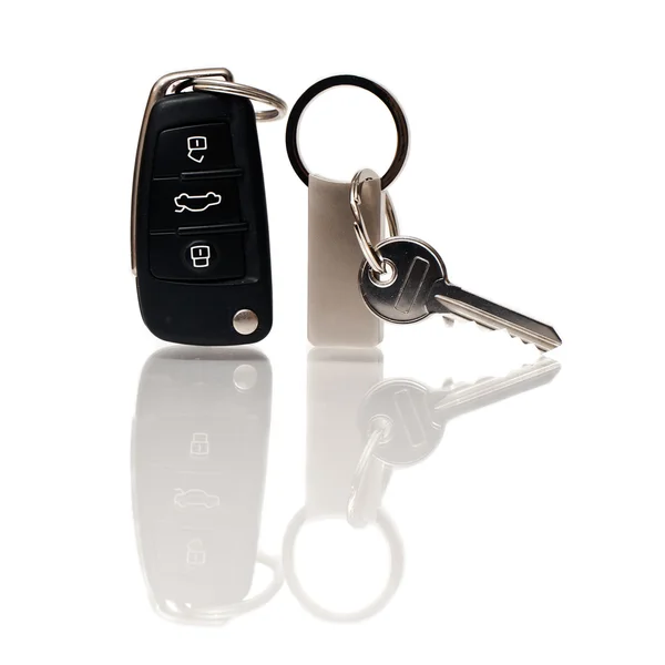 Bil och hus nycklar, med spegel skugga — Stockfoto