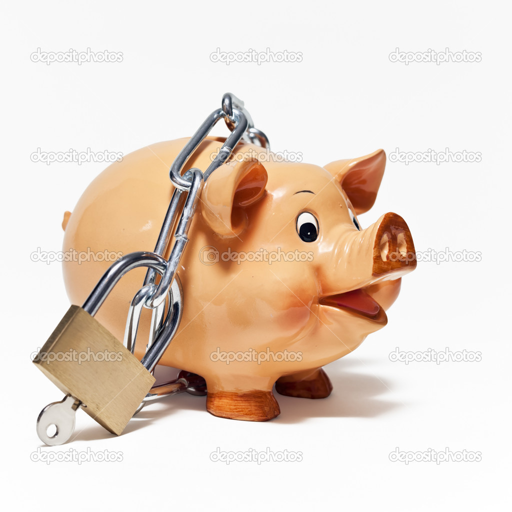 Piggy bank secured with padlock isolated on white background.