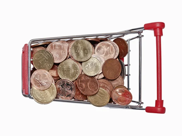 A shopping cart is filled with well-euro coins — Stock Photo, Image