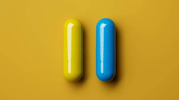 Two Medicine Capsules Tablets Isolated Yellow Background Yellow Blue Pills — Fotografia de Stock