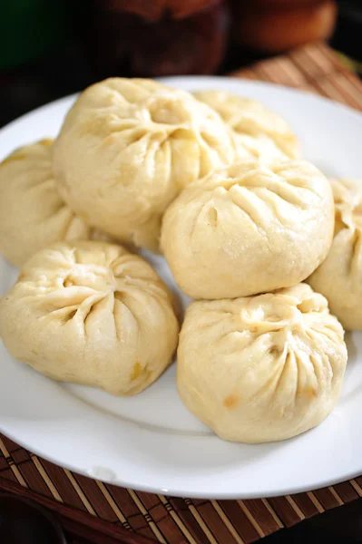 Petits pains chinois cuits à la vapeur, fond alimentaire . — Photo