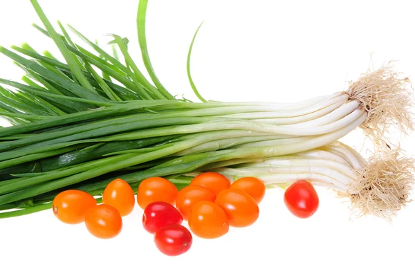 Spring onions and cherry tomato — Stock Photo, Image