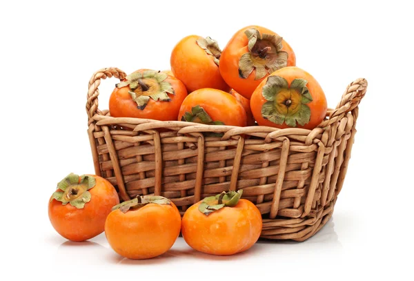 Persimmon auf weißem Hintergrund — Stockfoto