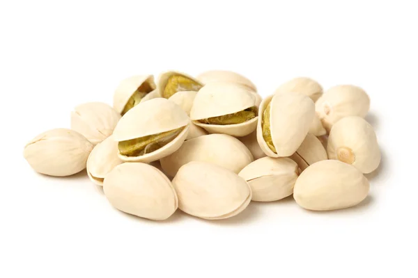 Pile of pistachio nuts on white background — Stock Photo, Image