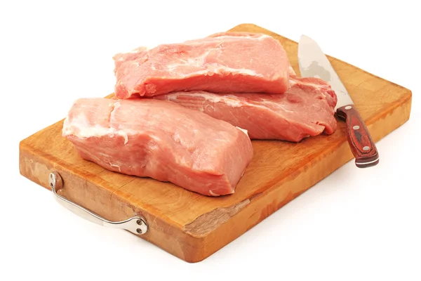 Frisches rohes Schweinefleisch auf weißem Hintergrund — Stockfoto