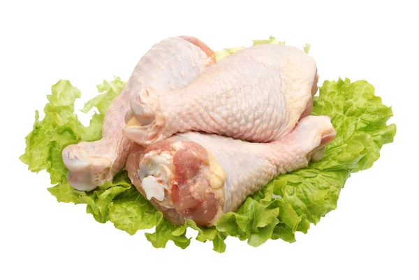 Raw chicken legs on a white background Stock Picture