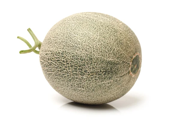 Melone reticolato su sfondo bianco — Foto Stock