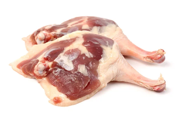 Gambe di pollo crude su sfondo bianco — Foto Stock