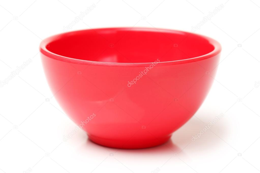 Colorful plastic tableware on white background