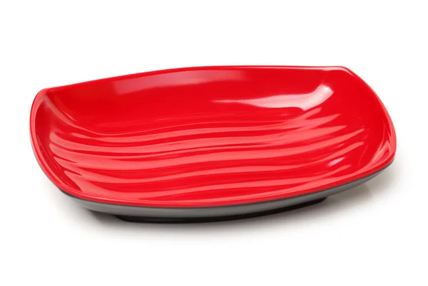 Разноцветная пластиковая посуда на белом фоне — стоковое фото