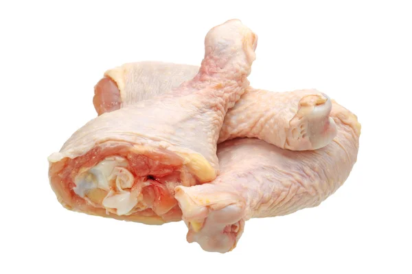 Rohe Hühnerkeulen auf weißem Hintergrund — Stockfoto