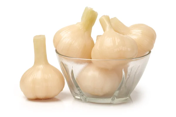 Sweet and sour garlic on white background — Stock Photo, Image