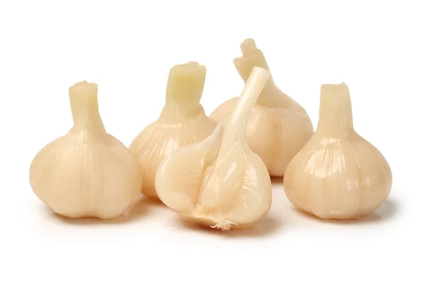 Sweet and sour garlic on white background — Stock Photo, Image