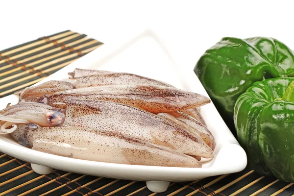 Freshly caught squid on white background — Stock Photo, Image