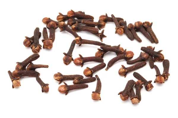 Dry cloves on white background — Stock Photo, Image