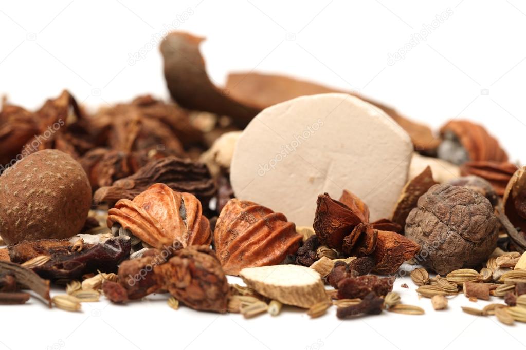 Composition with different spices and herbs isolated on white background