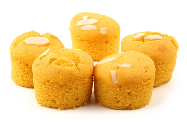Cup shape sponge cake on white background — Stock Photo, Image