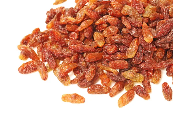 Brown raisins on a white background — Stock Photo, Image