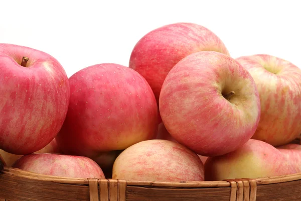 Apples in a basket on a white background. — Stock Photo, Image