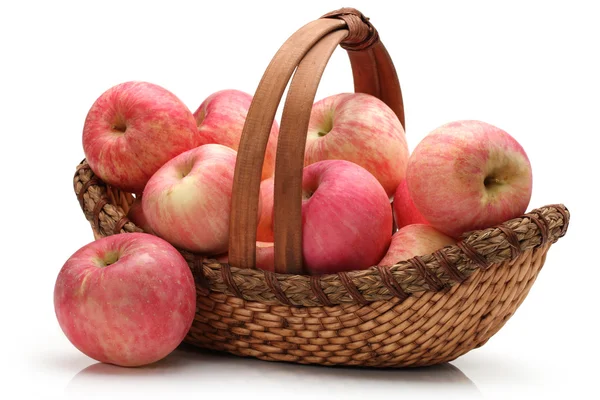 Apples in a basket on a white background. — Stock Photo, Image