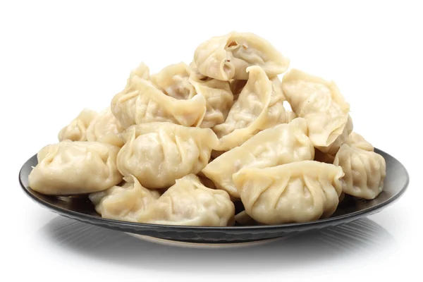 Kinesiska dumplings på vit bakgrund — Stockfoto