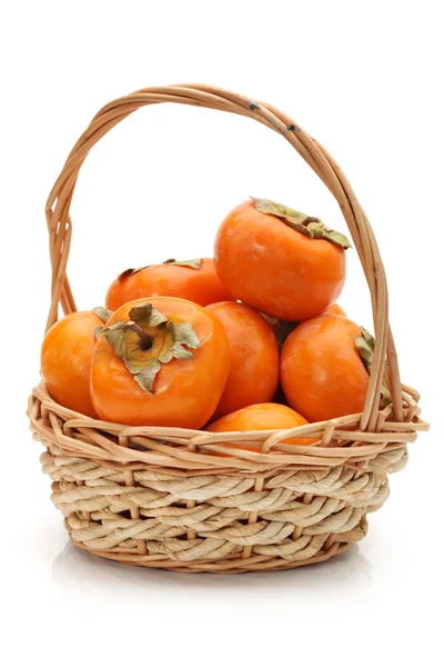 Persimmon auf weißem Hintergrund — Stockfoto