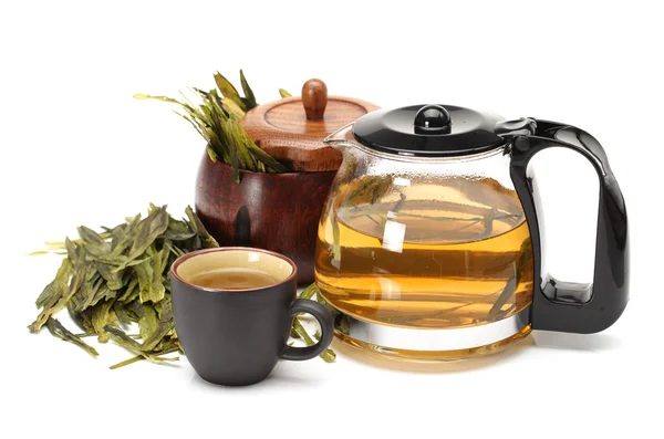 Teacup and teapot of tea on white background — Stock Photo, Image